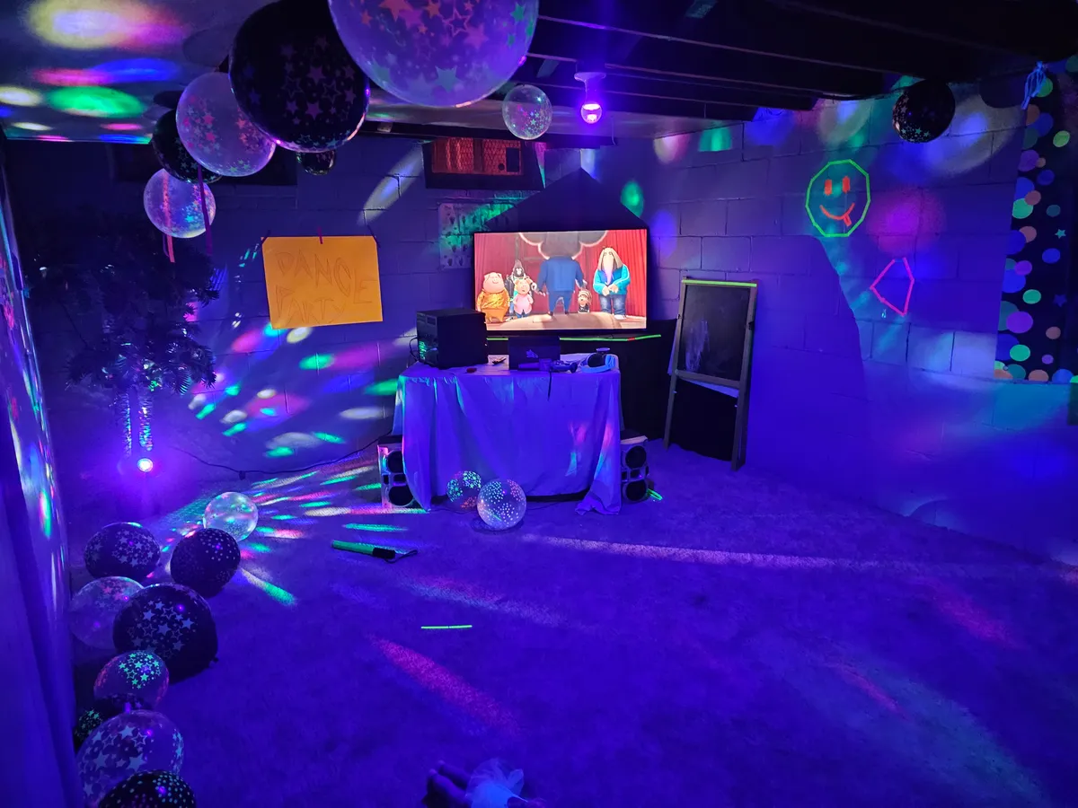 Blacklight party room with disco lights