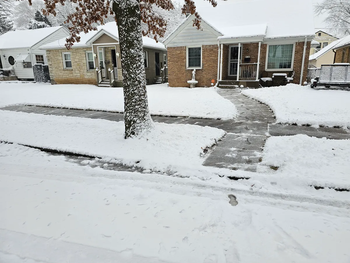 Cleared residential walkway in winter